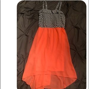 Black and white top with orange bottom dress